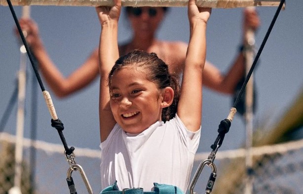 Kid on trapeze